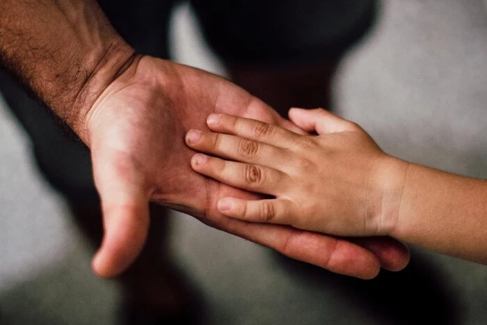 Parents take a child before adoption
