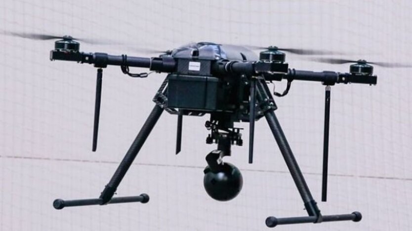 Robot for mass production of fiber-optic drone